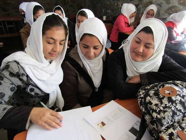 Afghan girls learning together in a classroom